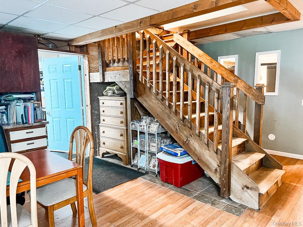 100 Old Tacy Road, Unit TR95 Bethel, NY 12783 - Photo 39 of 50 Stairs featuring wood finished floors and baseboards