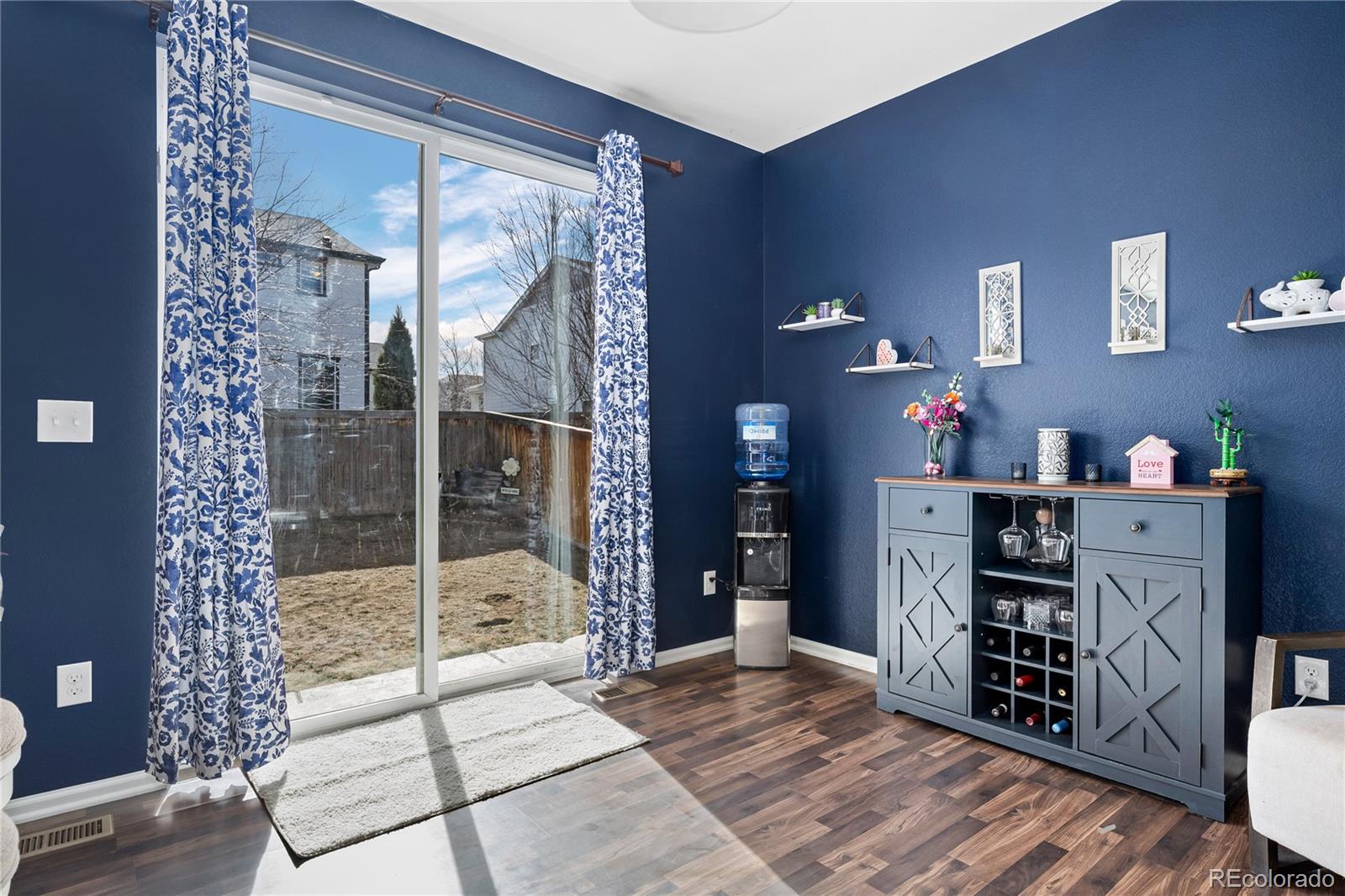 13826 West Layton Circle Morrison, CO 80465 - Photo 15 of 43 a bedroom with furniture and window
