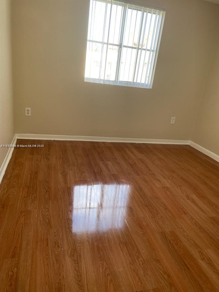 6065 Northwest 186th Street, Unit 304 Hialeah, FL 33015 - Photo 4 of 10