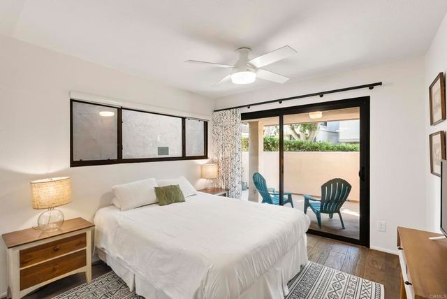 a bathroom with a bathtub and a sink