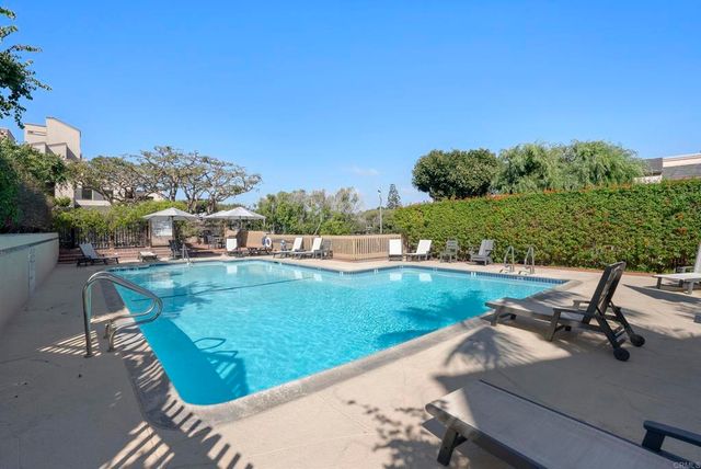 a view of a backyard with plants