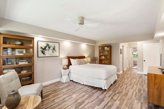 a bathroom with double sink and a mirror