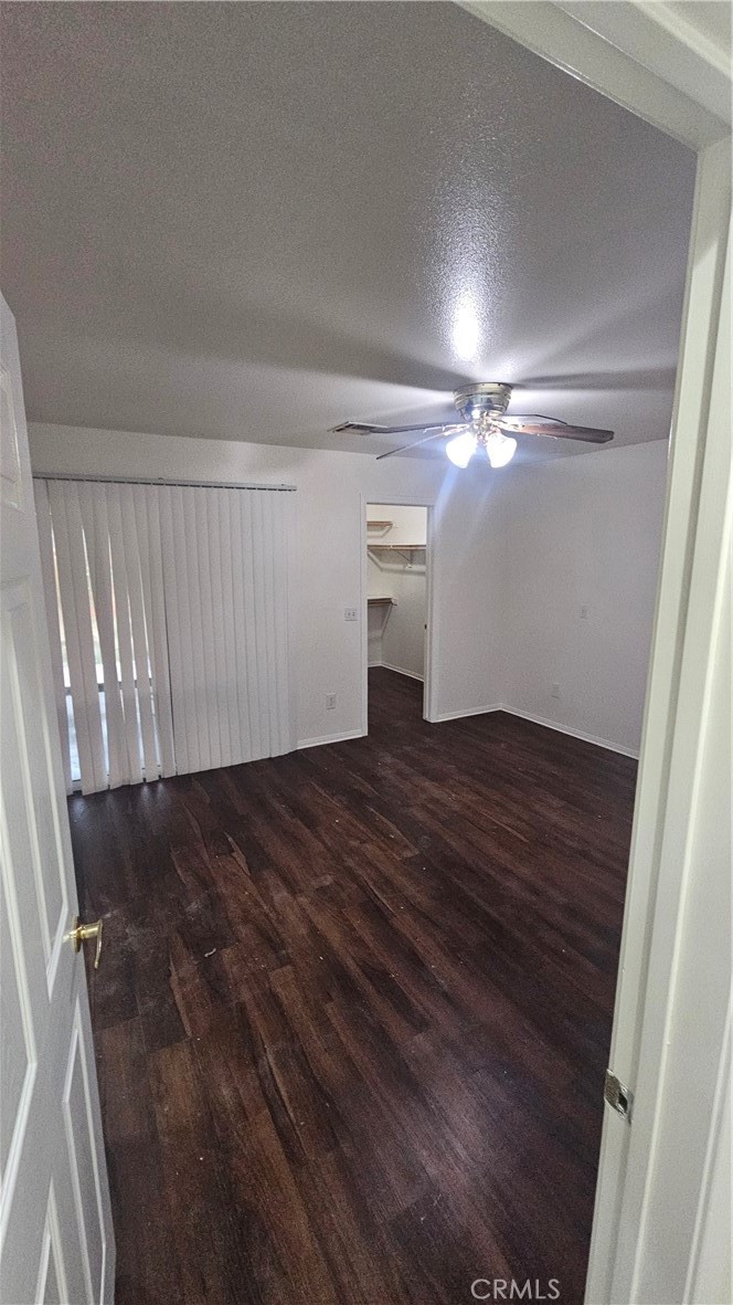 16528 Avenida Mirola Desert Hot Springs, CA 92240 - Photo 9 of 9 a view of a room with wooden floor