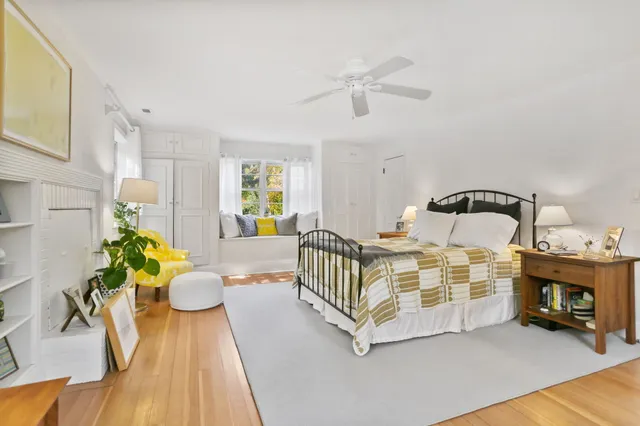 a bedroom with furniture and a bed