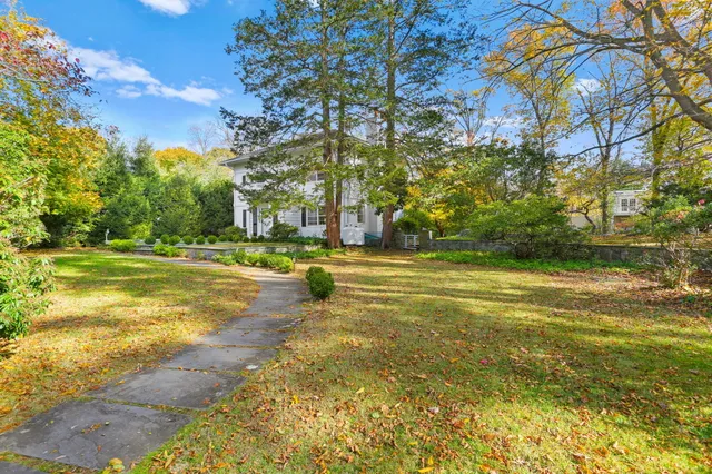 a view of swimming pool with an outdoor space and seating area