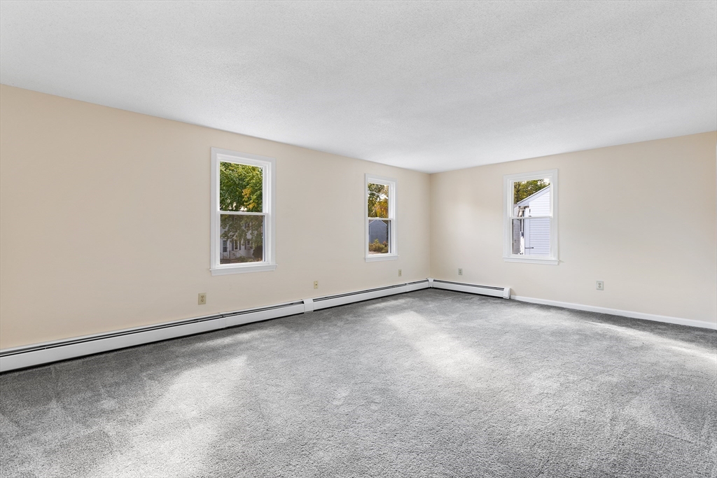 56 Vincent Circle Worcester, MA 01604 - Photo 12 of 23 an empty room with windows