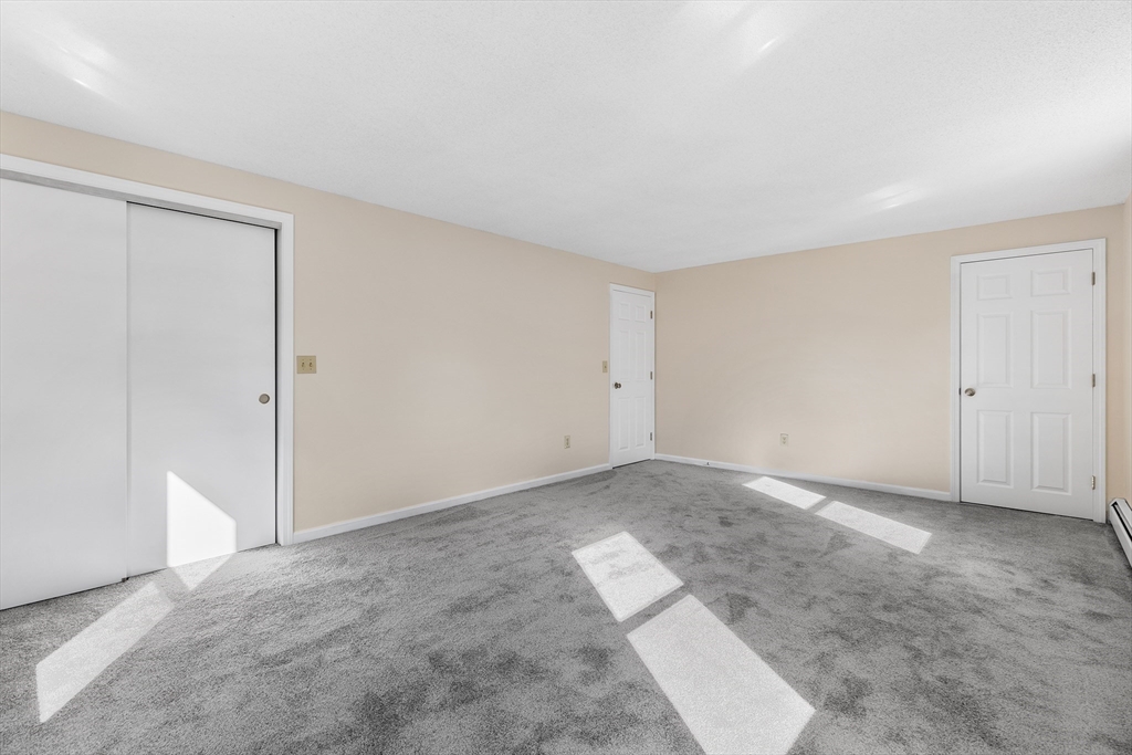 56 Vincent Circle Worcester, MA 01604 - Photo 13 of 23 an empty room with an entryway