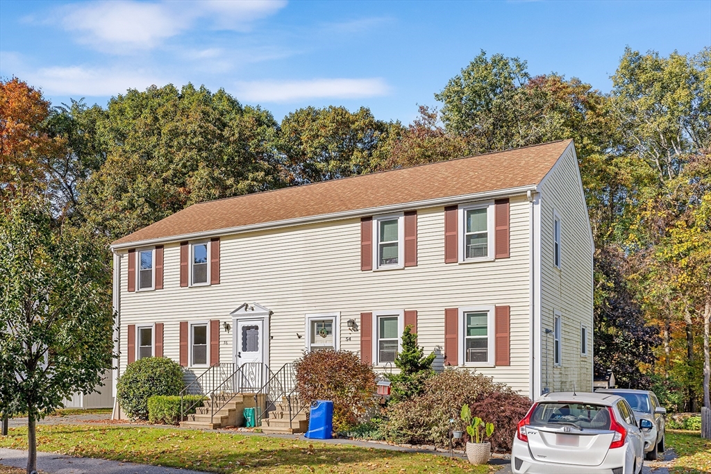 56 Vincent Circle Worcester, MA 01604 - Photo 21 of 23 a front view of a house with garden