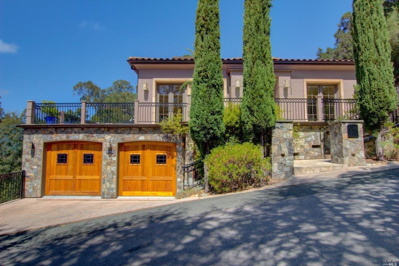 a front view of a house with yard