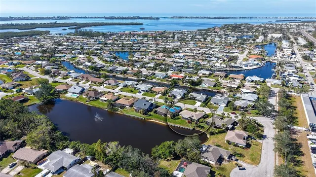 an aerial view of a building and outdoor space