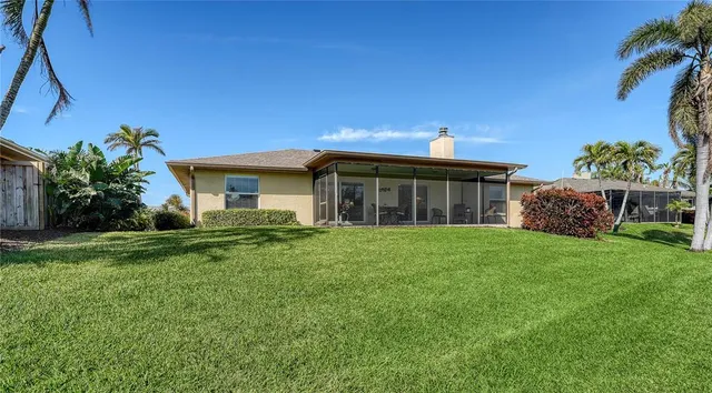a view of a patio with chairs and tables