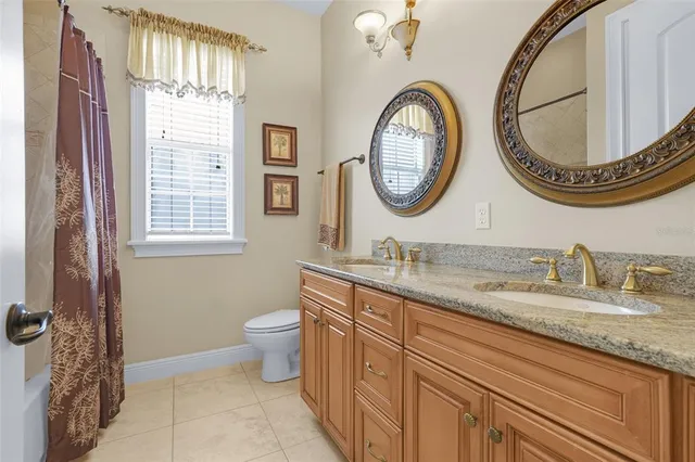 a view of a room with lots of stuff and hardwood floor