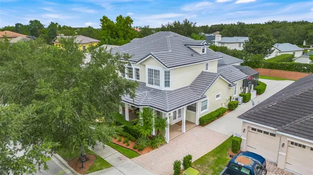 an aerial view of a house with a garden