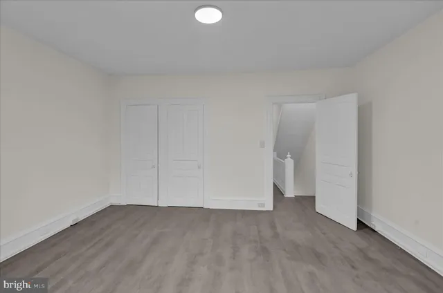 an empty room with windows