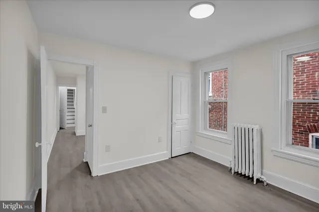 an empty room with windows