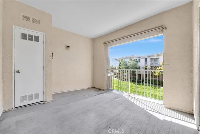 a view of a room with a large window