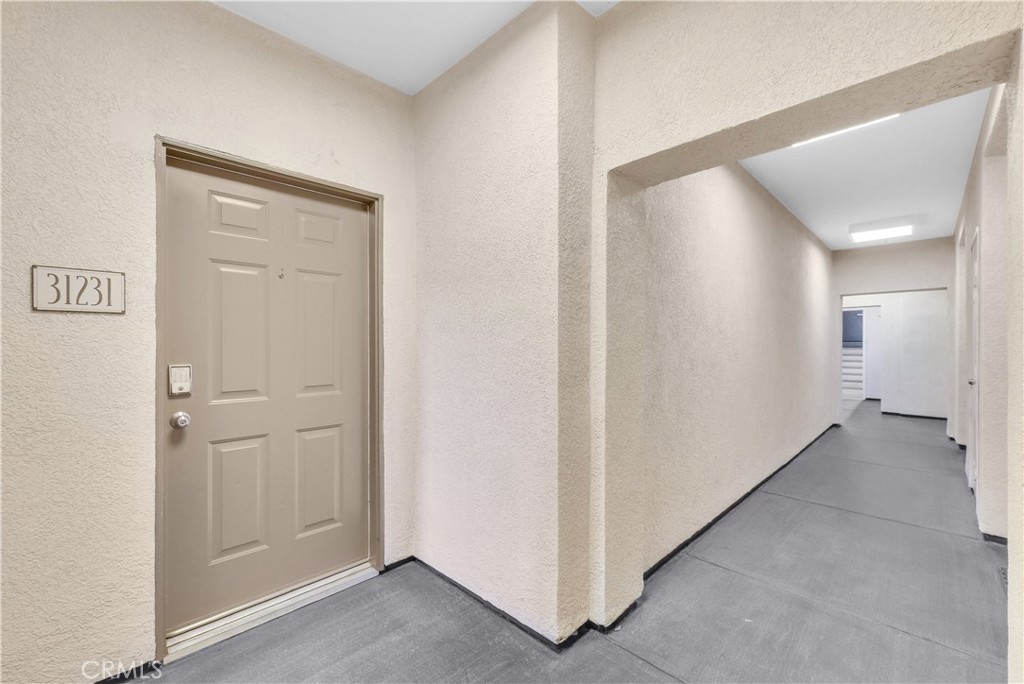 31231 Taylor Lane Temecula, CA 92592 - Photo 3 of 27 a view of a hallway with closet area