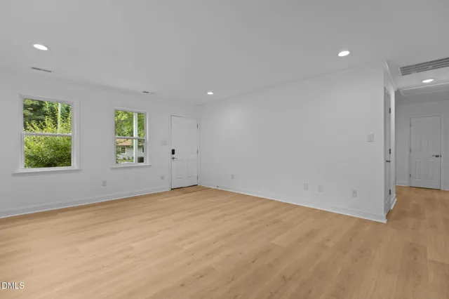 an empty room with windows