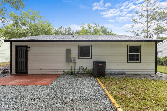 a backyard of a house with lots of green space