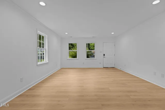 an empty room with windows