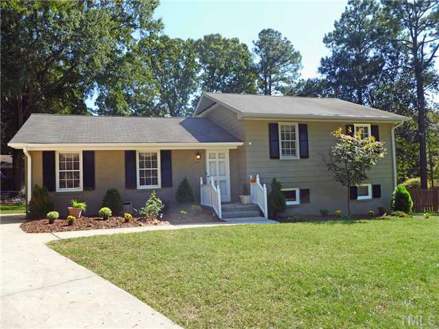 5404 Christman Court Raleigh, NC 27609 - Photo 1 of 20 front view of a house with a yard