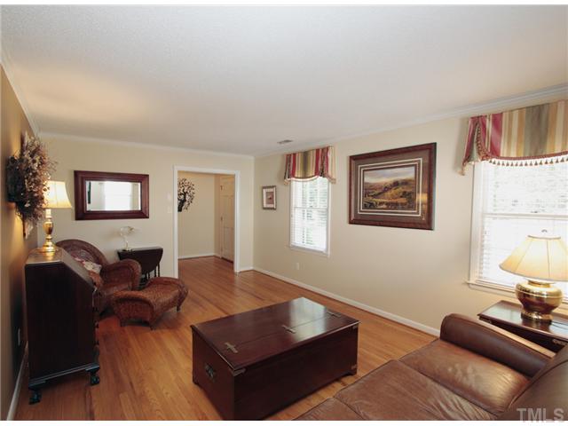 5404 Christman Court Raleigh, NC 27609 - Photo 2 of 20 a living room with furniture rug and lamp