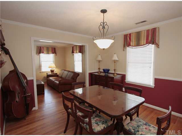 5404 Christman Court Raleigh, NC 27609 - Photo 4 of 20 a view of a livingroom and dining room