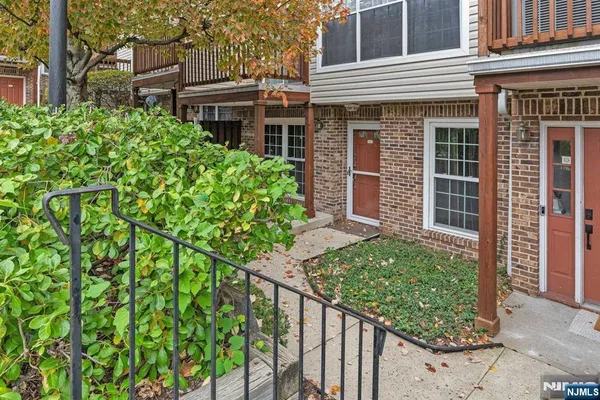 a house view with a garden space