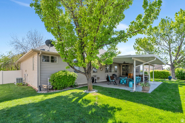 1602 Renaissance Way Springville, UT 84663 - Photo 34 of 42 Back of property featuring ceiling fan and a patio