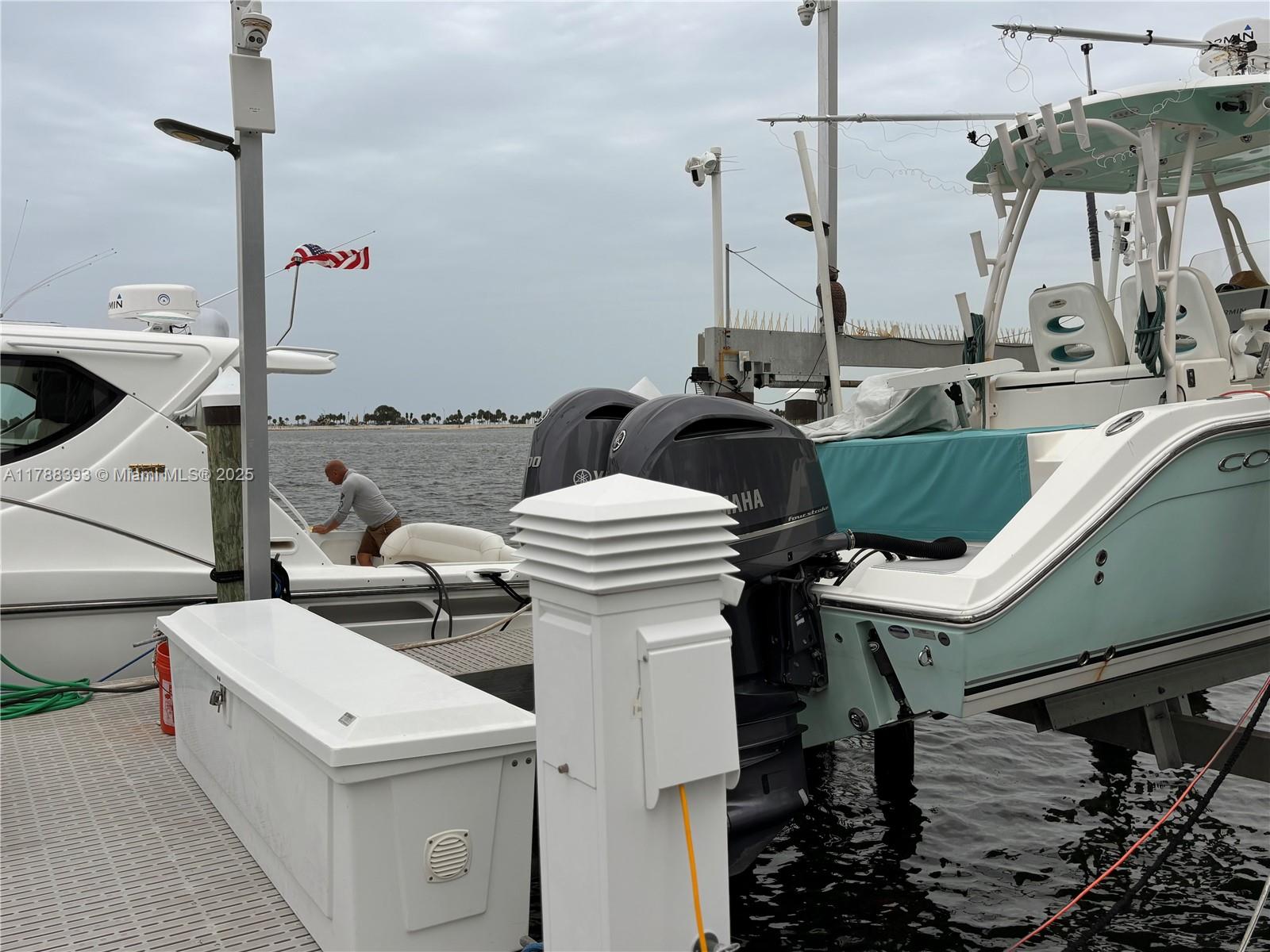 1915 Brickell Avenue Miami, FL 33129 - Photo 4 of 6 a bathroom with a sink and mirror