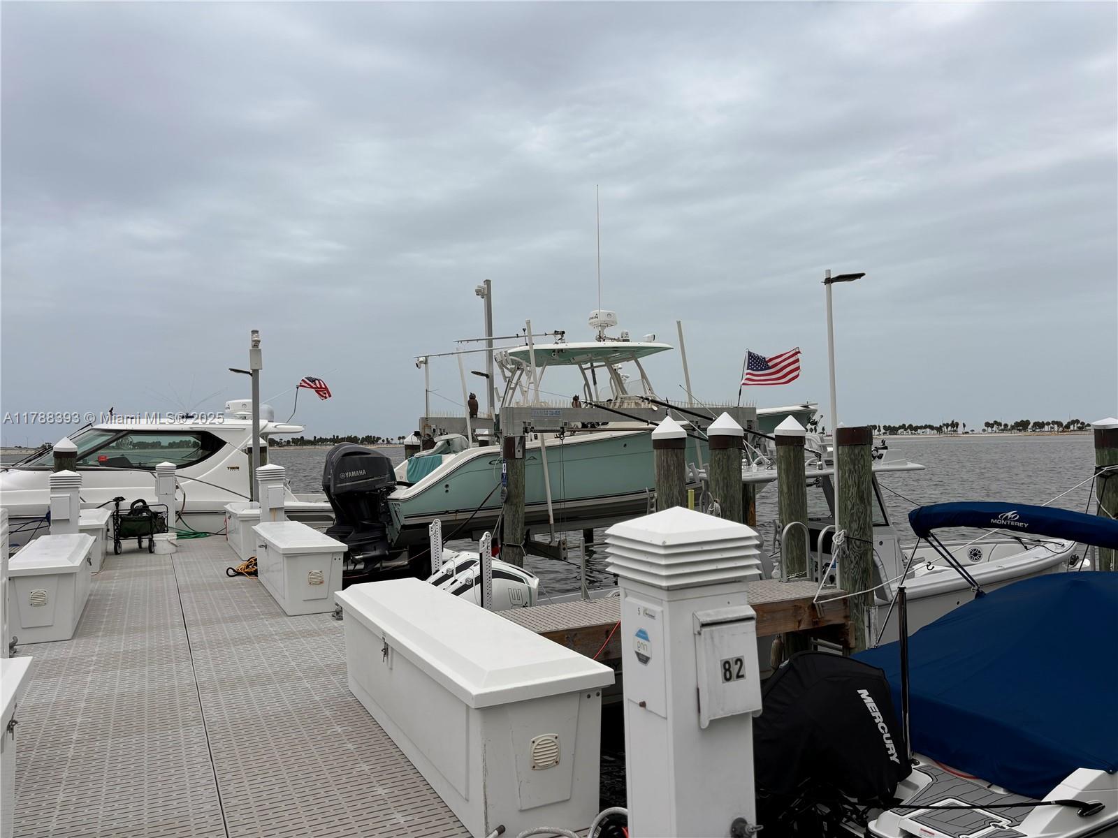 1915 Brickell Avenue Miami, FL 33129 - Photo 5 of 6 a group of people sitting on a roof deck