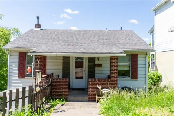 a front view of a house with a porch