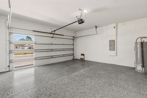 a view of water heater room with a yard