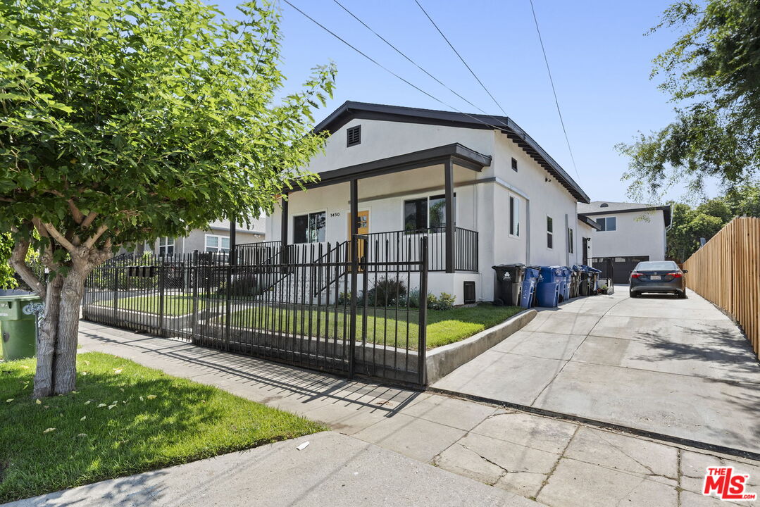 1450 Ricardo Street Los Angeles, CA 90033 - Photo 14 of 19 a front view of a house with a garden