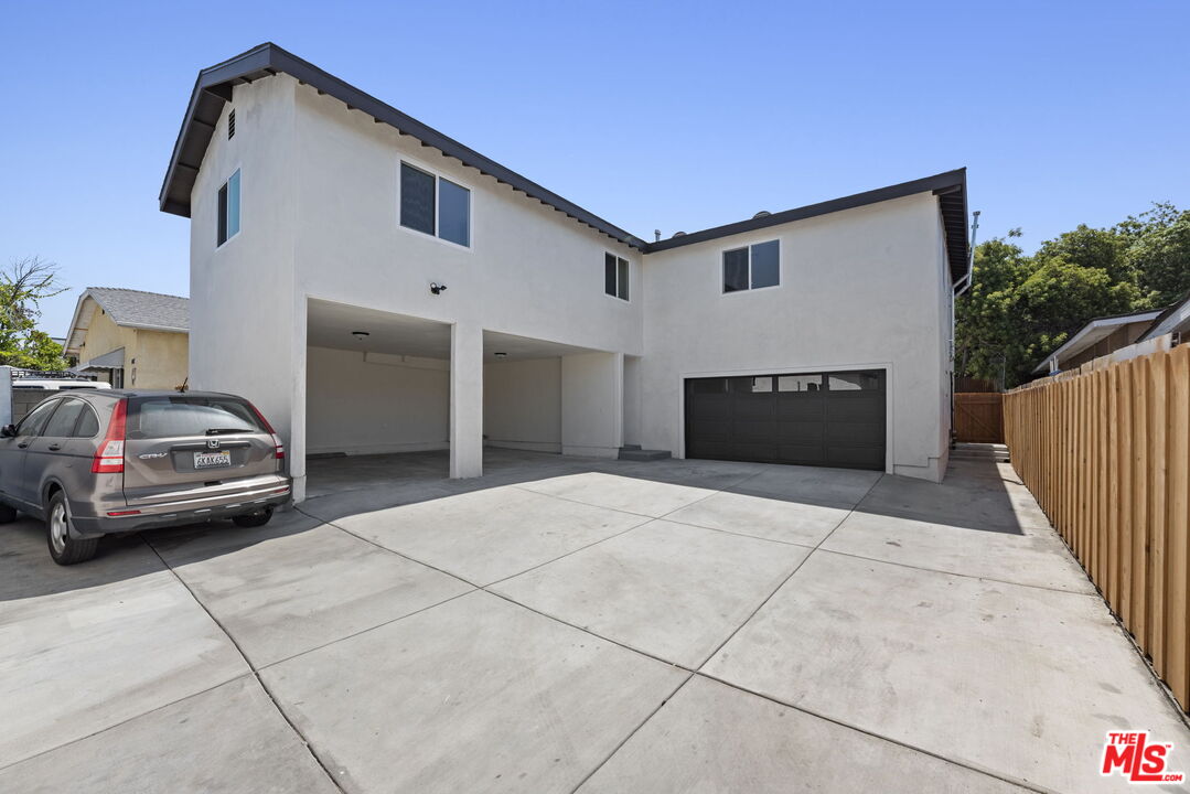1450 Ricardo Street Los Angeles, CA 90033 - Photo 15 of 19 a front view of a house with parking space