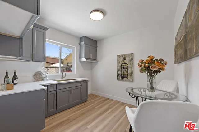 a kitchen with sink and window