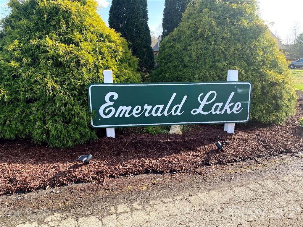 0 Emerald Parkway, Unit 35 Rutherfordton, NC 28139 - Photo 7 of 9 a sign broad in front of the road