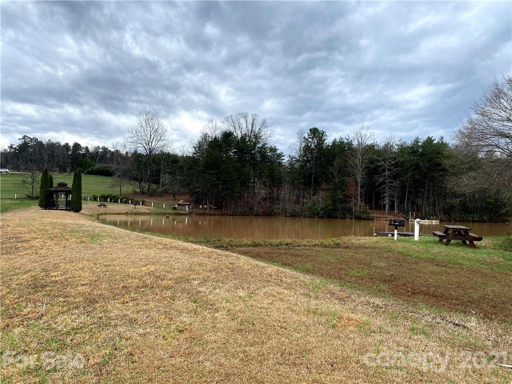 0 Emerald Parkway, Unit 35 Rutherfordton, NC 28139 - Photo 8 of 9 a swimming pool with trees in the background