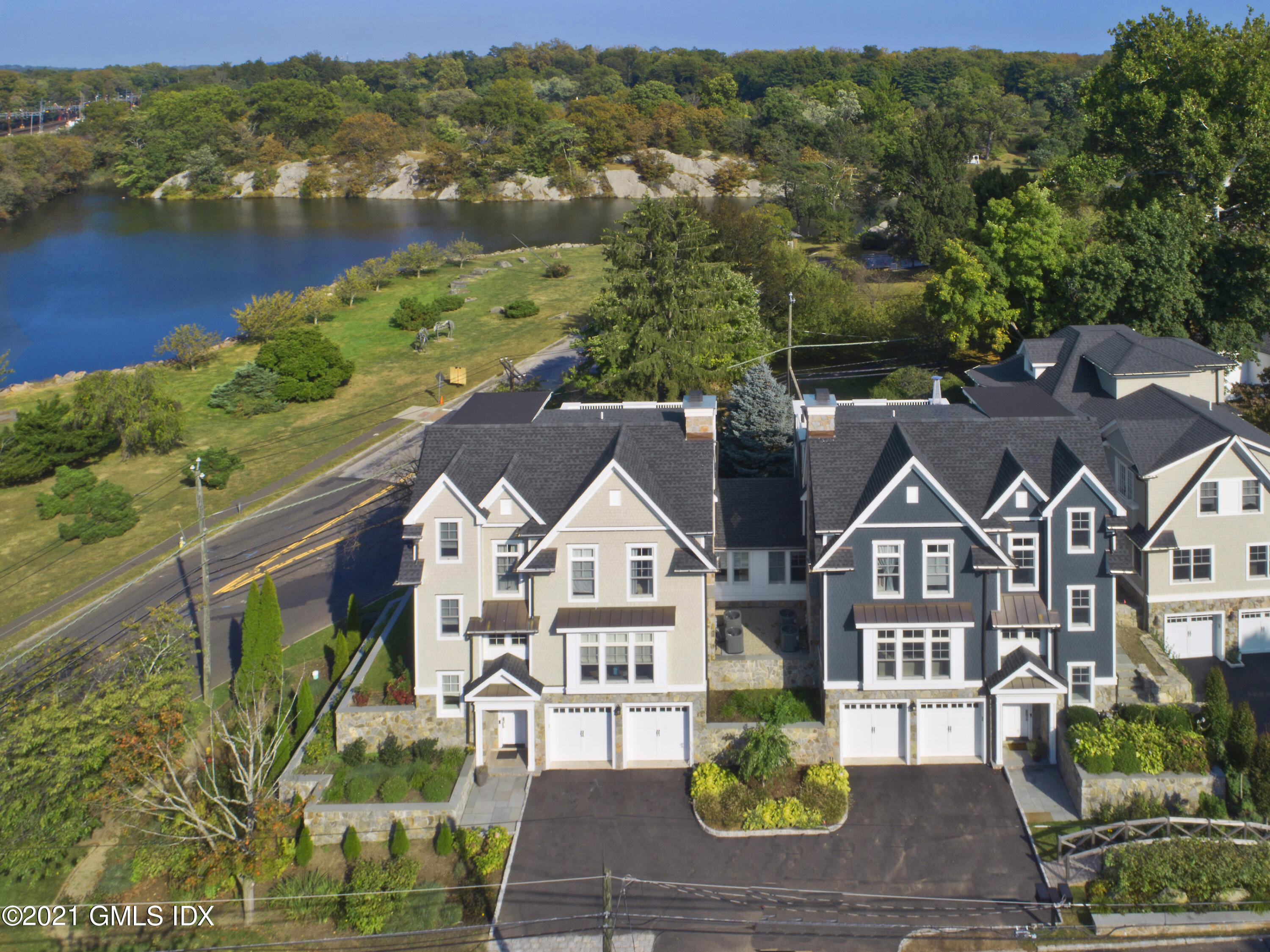 1 Home Place, Unit B Greenwich, CT 06830 - Photo 26 of 26 an aerial view of residential houses with outdoor space and river