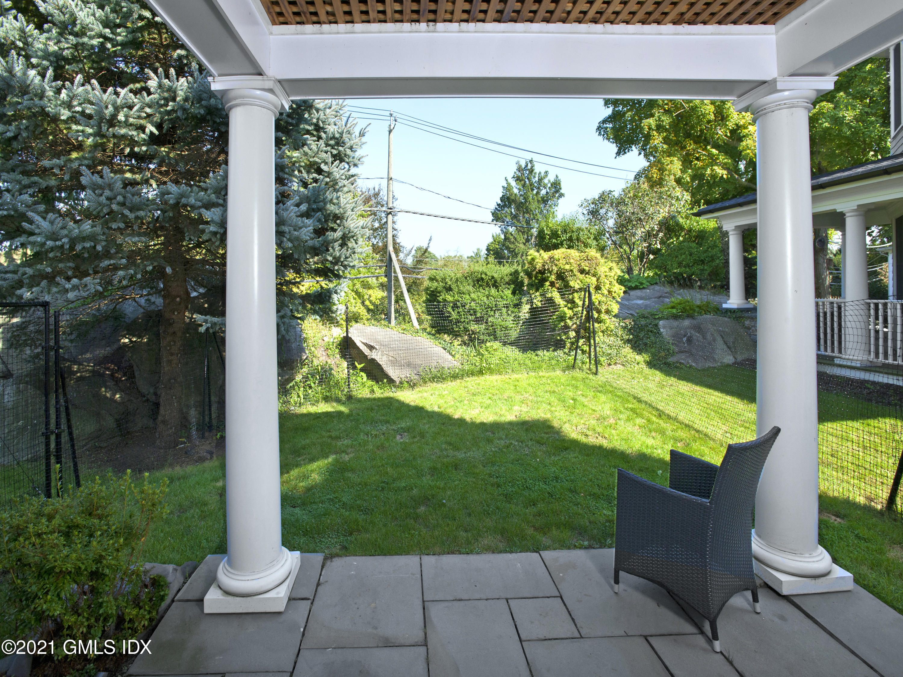 1 Home Place, Unit B Greenwich, CT 06830 - Photo 8 of 26 a view of a yard with potted plants