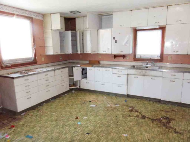 8725 Elva Road DeKalb, IL 60115 - Photo 8 of 14 a kitchen with granite countertop a sink and a stove