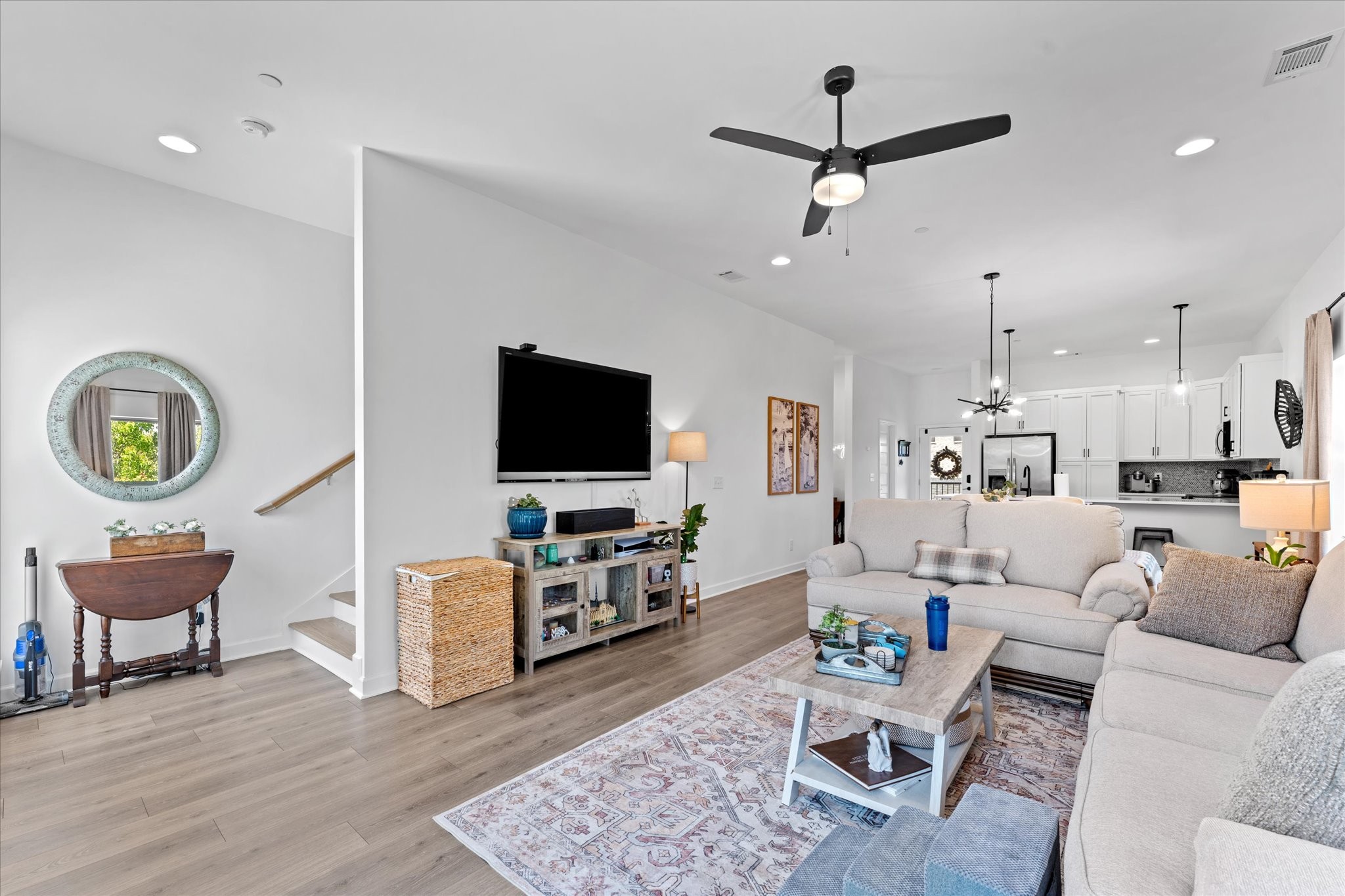 211 Folsom Pass, Unit B Spring Hill, TN 37174 - Photo 12 of 24 a living room with furniture and a flat screen tv