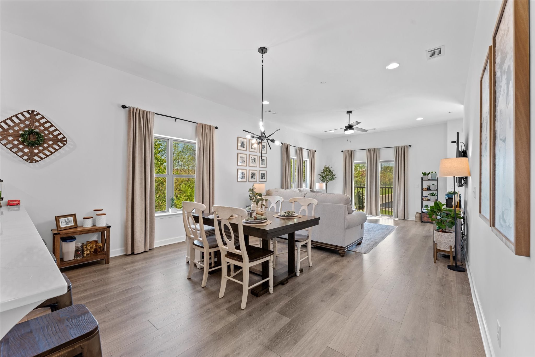 211 Folsom Pass, Unit B Spring Hill, TN 37174 - Photo 9 of 24 a view of a dining room with furniture window and wooden floor