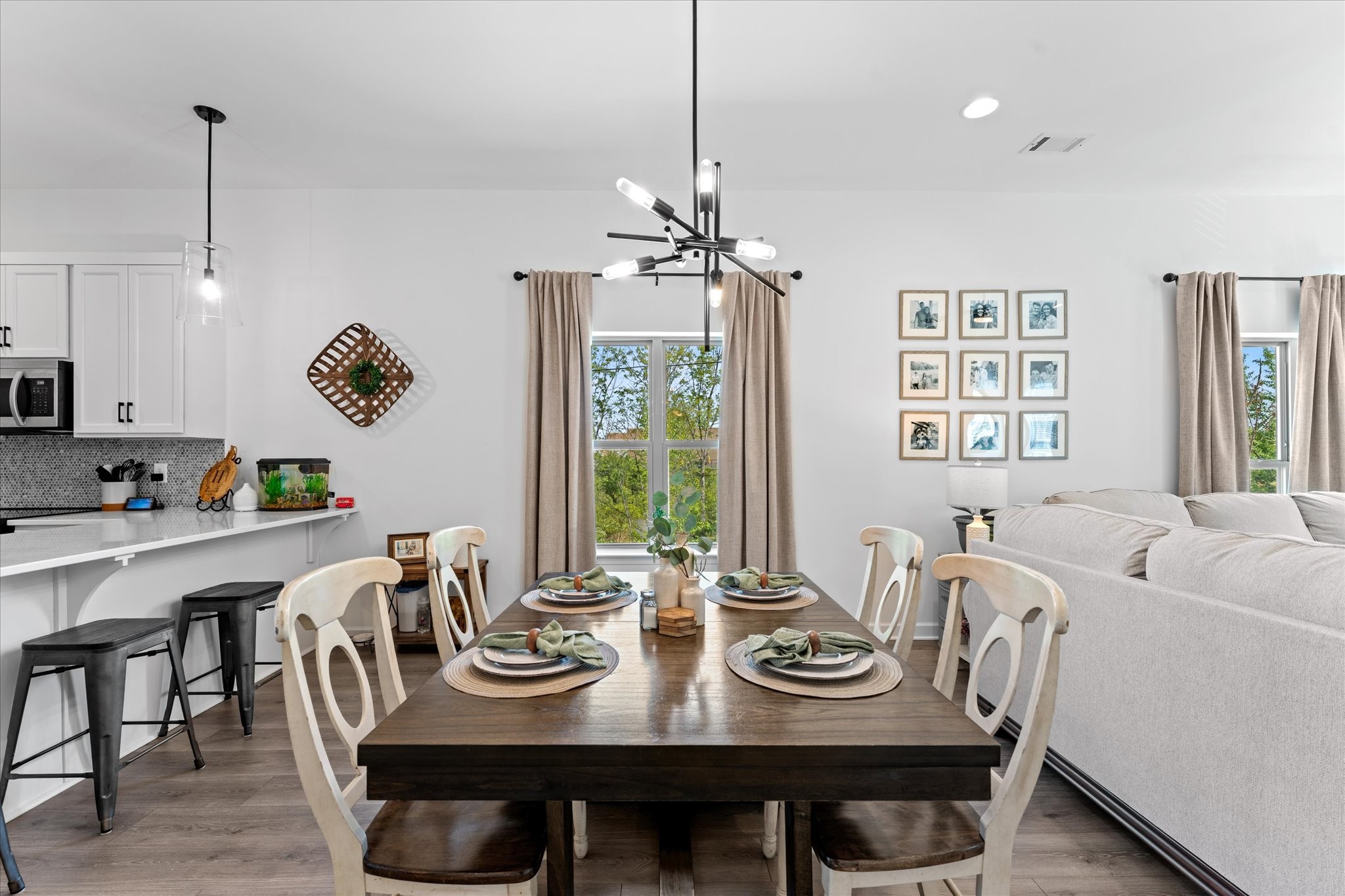 211 Folsom Pass, Unit B Spring Hill, TN 37174 - Photo 10 of 24 a view of a dining room with furniture window and outside view