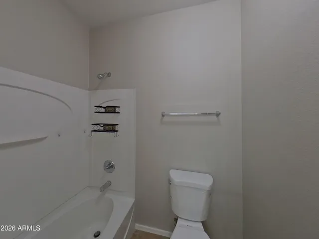 a bathroom with a sink a mirror a vanity and shower