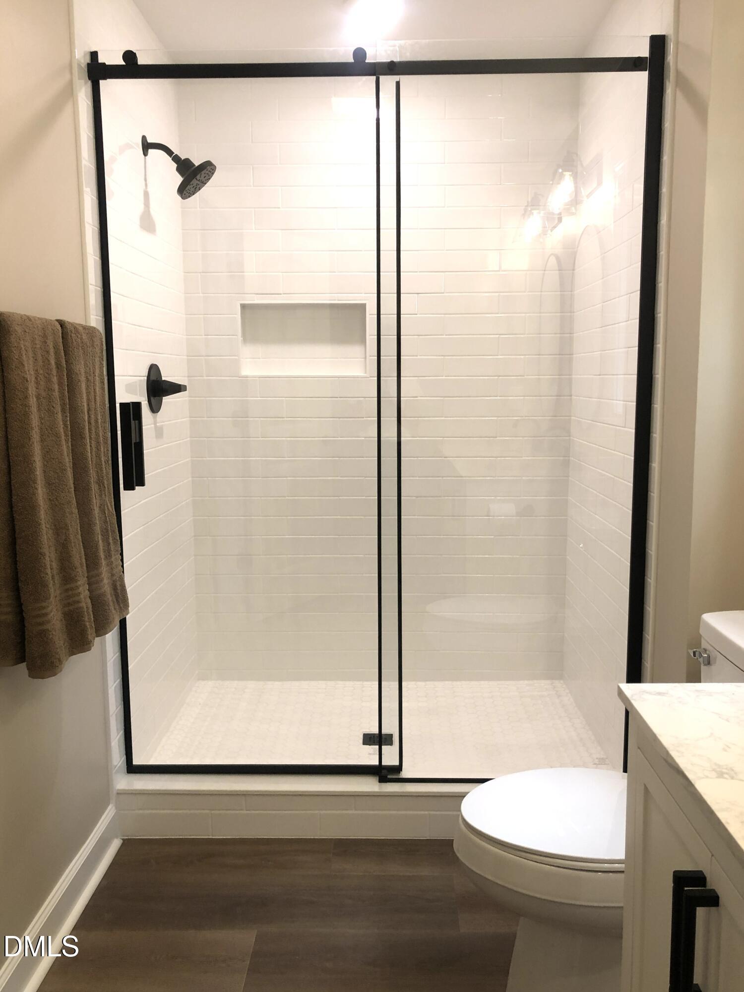 95 Smith Taylor Trail Roxboro, NC 27574 - Photo 5 of 47 a bathroom with a shower and a toilet