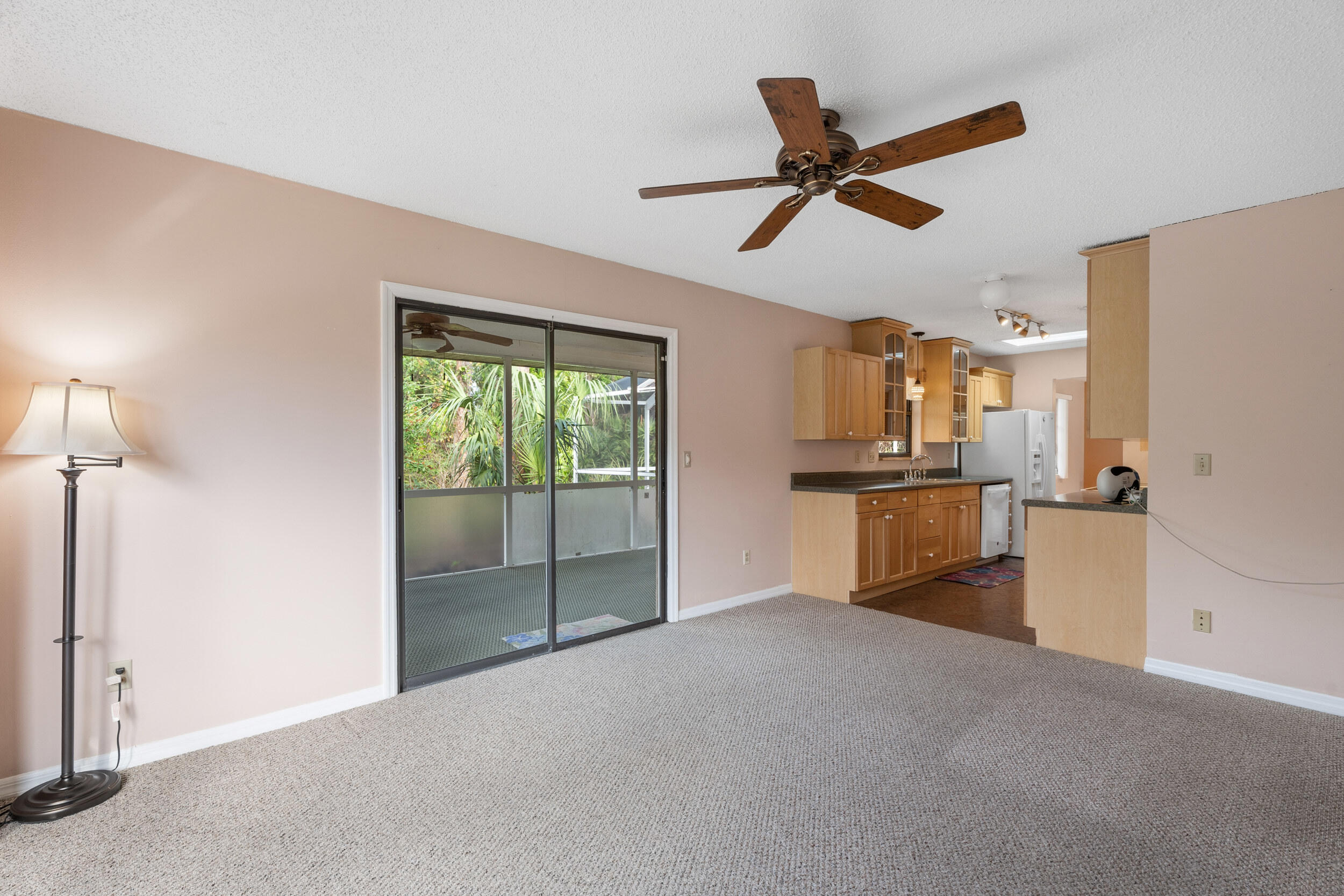 226 Del Monte Road Sebastian, FL 32958 - Photo 12 of 34 Family to kitchen and patio