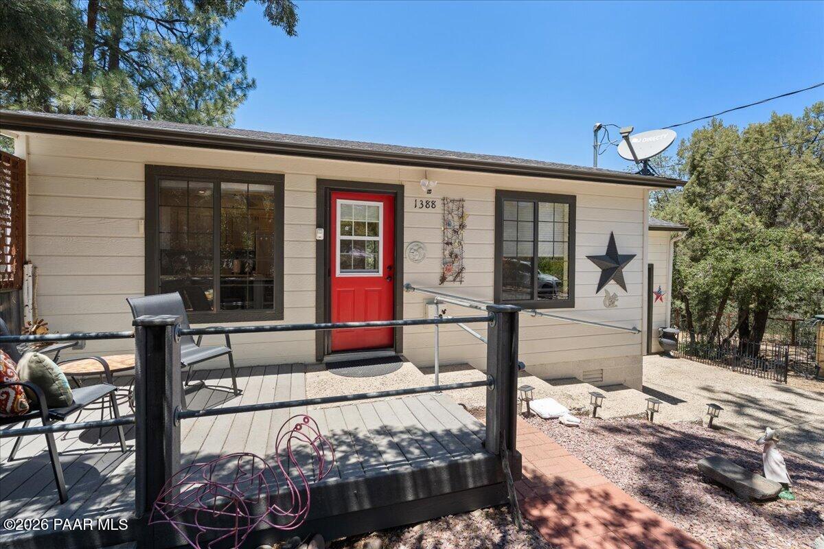 1388 East Pine Ridge Drive Prescott, AZ 86303 - Photo 3 of 16 a front view of a house with patio