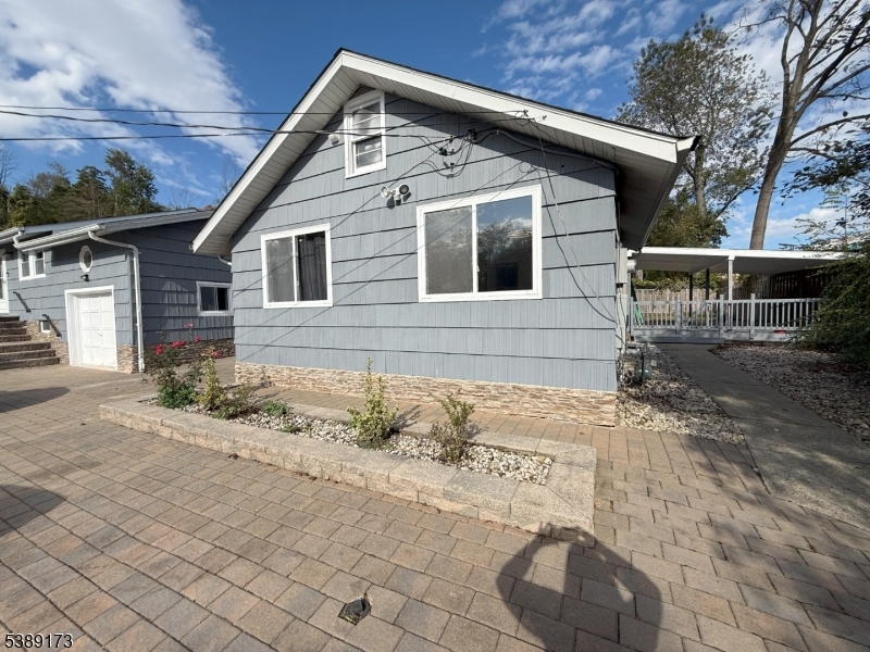 62 Wolfe Road, Unit 63 Budd Lake, NJ 07828 - Photo 1 of 19 a front view of house
