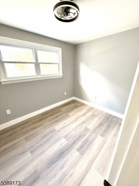 62 Wolfe Road, Unit 63 Budd Lake, NJ 07828 - Photo 11 of 19 an empty room with a window